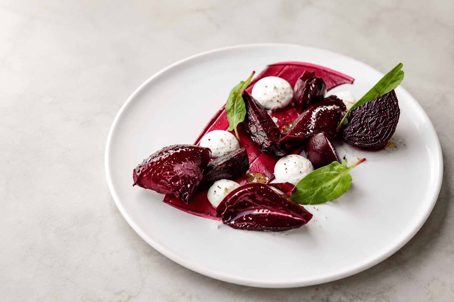 Grilled and pickled beet root salad with goat cheese and caramel pecan nuts 