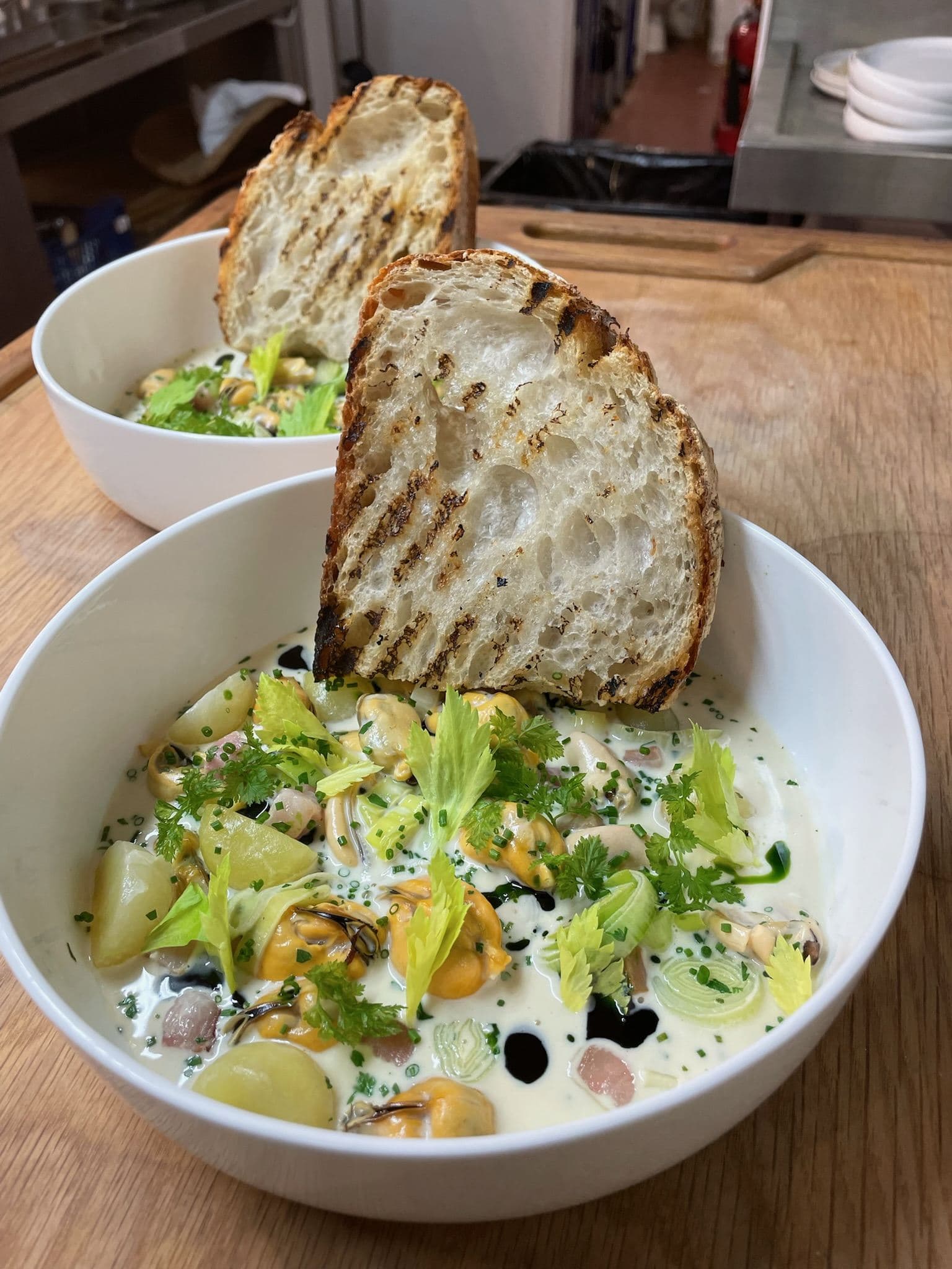 Cornish Mussel Ragout, Spring Vegetables & Dill Oil.