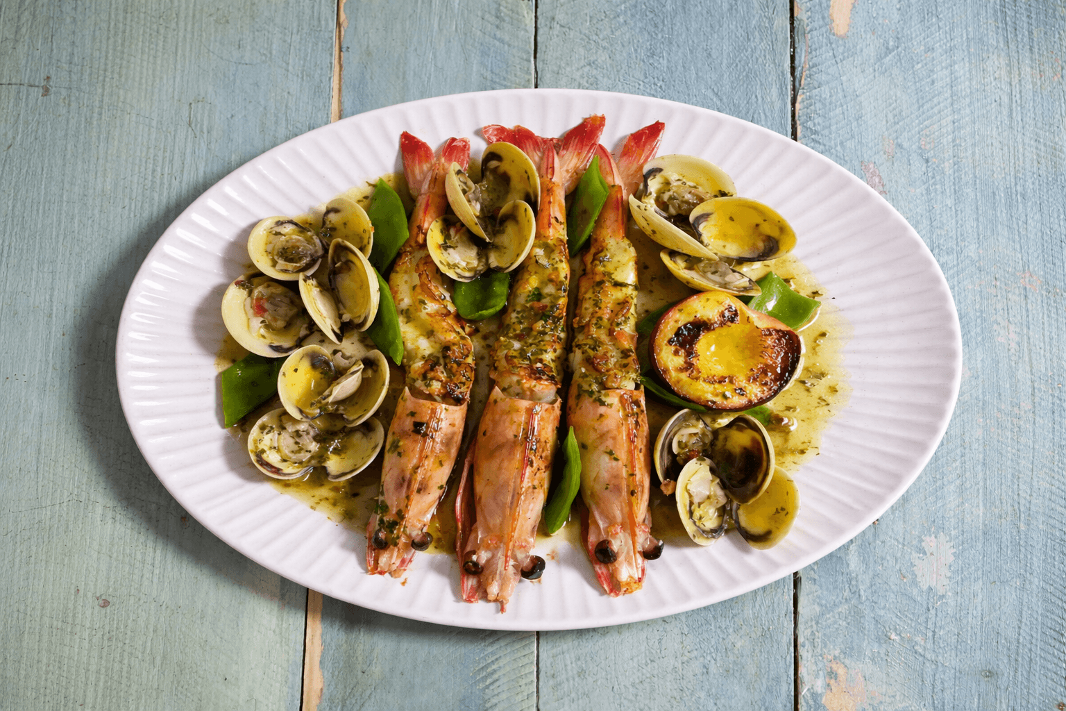 Grilled King Prawns and Yellow Peach with Pan-Fried Clams and Chimichurri Salsa